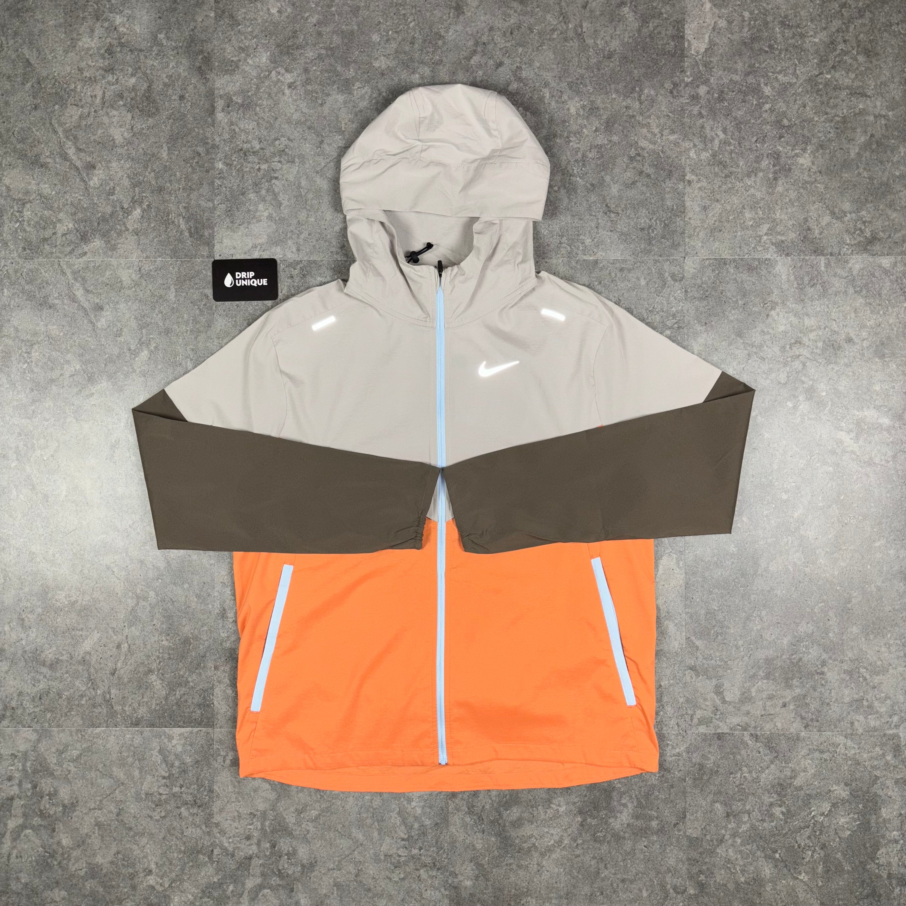 Orange windbreaker nike deals