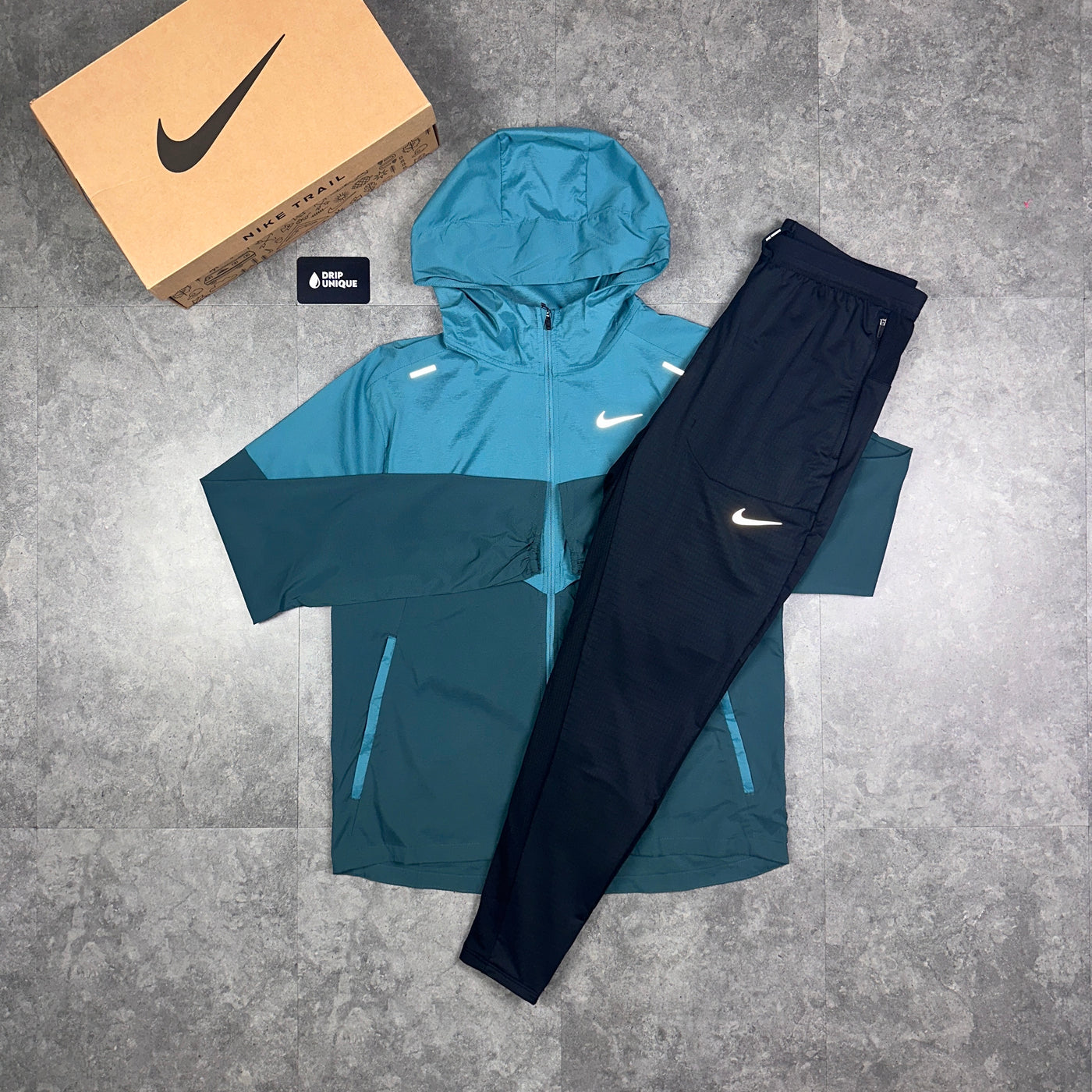 Nike windrunner black teal purple best sale