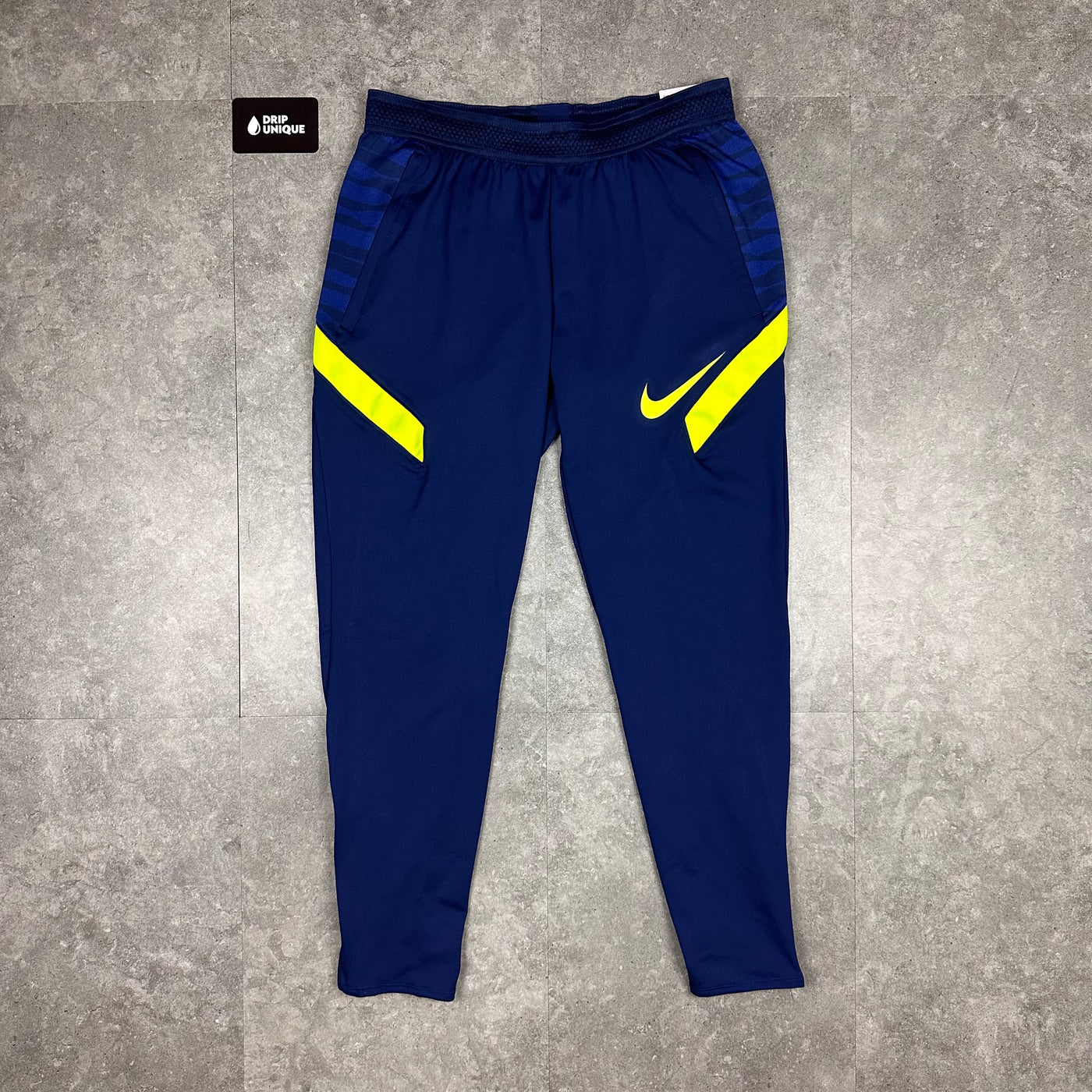 Men's Nike Dri-Fit Strike Pants in a Royal Blue colourway, dripuniqueuk