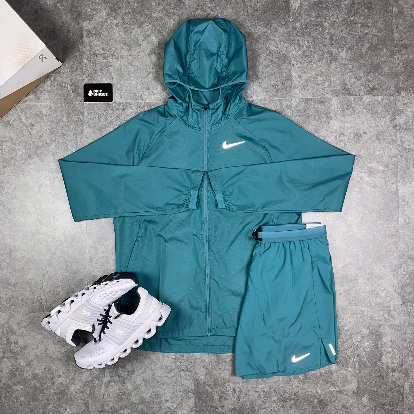 Men's Nike Essential Windrunner Jacket Teal & Flex Stride Shorts Set, combined with the white on running cloudswift 3 trainers, and the Nike flex stride shorts in Teal Green, dripuniqeuk