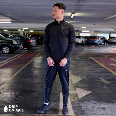 Men's Nike Pacer 1/4 Zip Top in Black, showcasing the front design, paired with the black elite phenom pants, dripuniqueuk