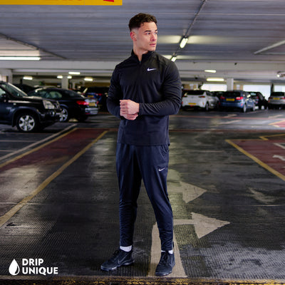 Men's Nike Pacer 1/4 Zip Black & Black Phenom Pants Set, worn by our model, showcasing the Nike Pacer 1/4 Zip Black & Black Phenom Pants Set, dripuniqueuk