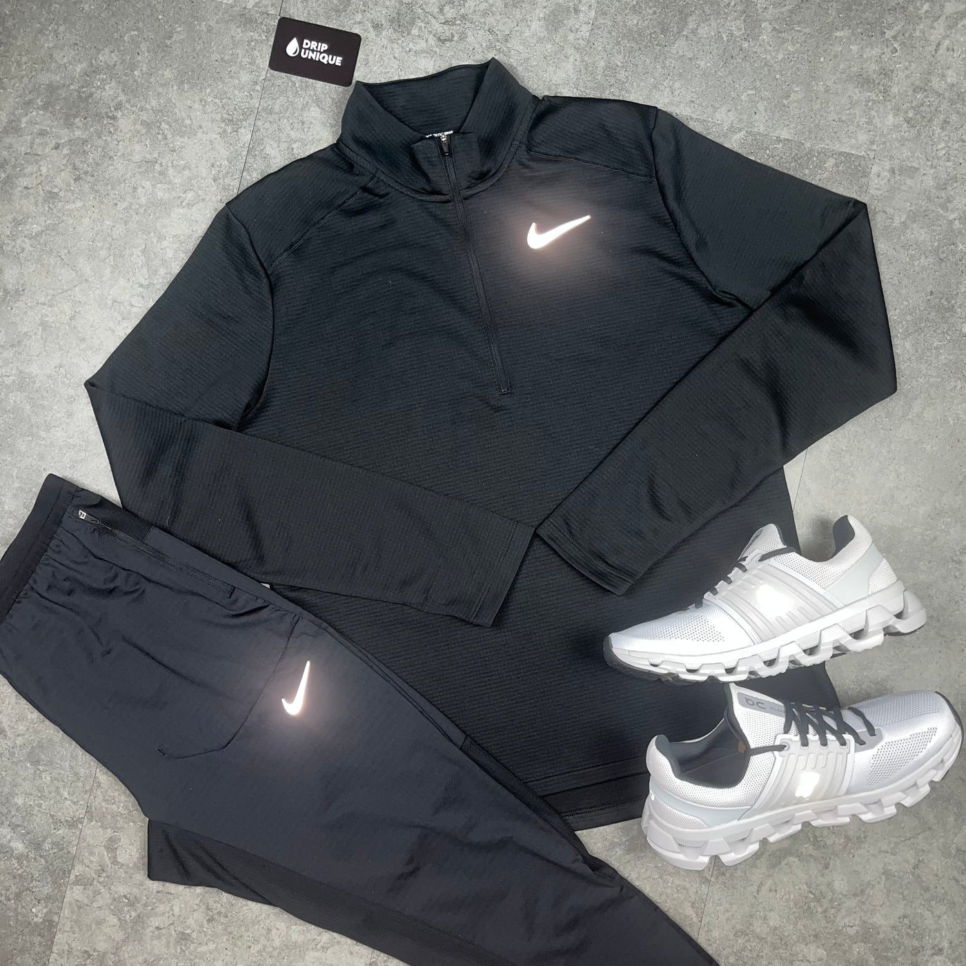 Men's Nike Pacer 1/4 Zip Top in a Black colourway along with the black Nike Phenom Pants and White On Running Cloudswift 3's, dripuniqueuk