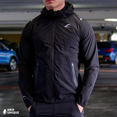 Men's ActiveLine Malay Jacket Blackout, ActiveLine Clothing, showcasing the ActiveLine Malay Jacket in the Blackout colourway, combined with the black onyx activeline pants to complete the look, worn by our model, dripuniqueuk