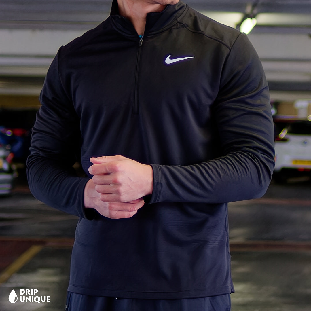 Men's Nike Pacer 1/4 Zip Top in Black, showcasing the front design, paired with the black elite phenom pants, dripuniqueuk