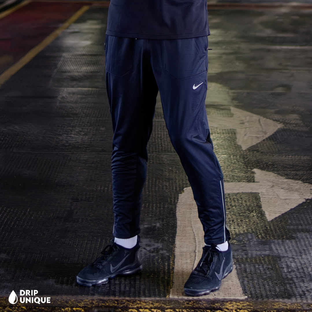 Men's Nike Pacer 1/4 Zip Black & Black Phenom Pants Set, worn by our model, showcasing the Nike Pacer 1/4 Zip Black & Black Phenom Pants Set, dripuniqueuk