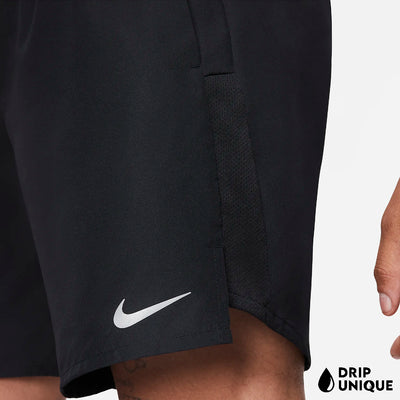 Men's Nike Dri Fit Challenger Shorts 7" in Black, showing the front design being worn by a model, close up, dripuniqueuk