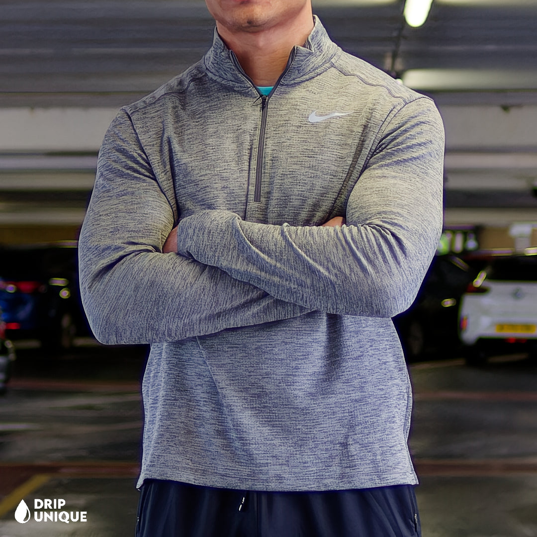 Men's Nike Pacer 1/4 Zip Top in Grey, showcasing the front design, paired with the nike elite phenom pants to complete the look, dripuniqueuk