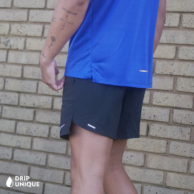 Men's Nike Flex Stride Shorts 7" in Black, showing the side design, paired with the Royal Blue Nike Miler 1.0 T-shirt, dripuniqueuk