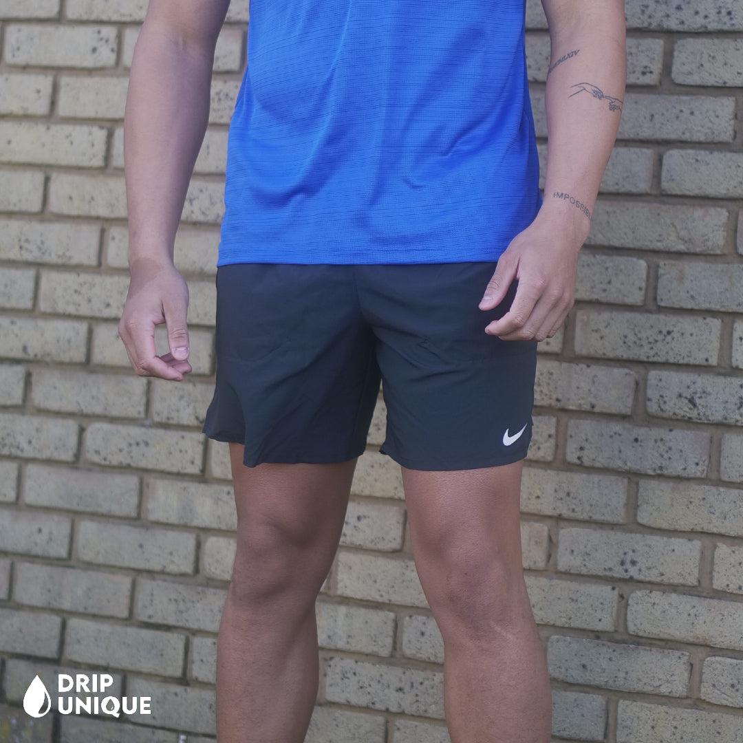 Men's Nike Flex Stride Shorts 7" in Black, showing the front design, paired with the Royal Blue Nike Miler 1.0 T-shirt, dripuniqueuk