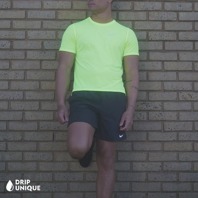 Men's Nike Flex Stride Shorts 7" in Black, showing the front design, paired with the Neon Green Nike Miler 2.0 T-shirt, dripuniqueuk