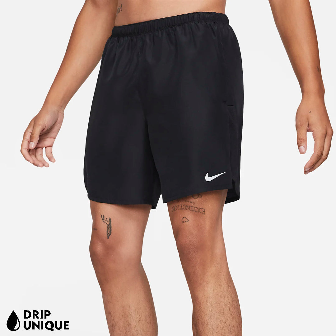 Men's Nike Dri Fit Challenger Shorts 7" in Black, showing the front design being worn by a model, dripuniqueuk